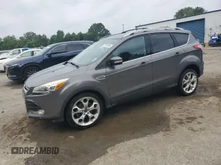 2013 Ford Escape Titanium z VIN 1FMCU0J97DUC15545, wystawiony jako Copart lot #57128155 z przebiegiem 115 243 mil mil oraz Szkody całkowita. Historia ofert i sprzedaży dostępna na DreamBid. Obrazek 1.