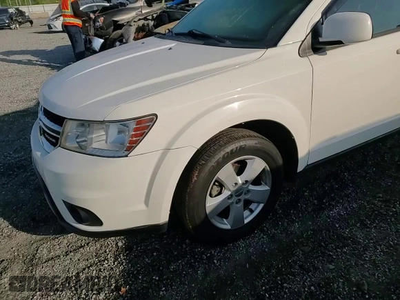 2012 Dodge Journey SXT z VIN 3C4PDCBGXCT153166, wystawiony jako Copart lot #53843265 z przebiegiem 177 289 mil mil oraz Szkoda całkowita • Salvage title. Historia ofert i sprzedaży dostępna na DreamBid. Obrazek 14.