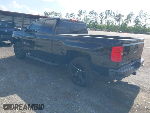 2015 Chevrolet Silverado 1500 LS with VIN 1GCRCPEH4FZ411072, listed as a IAAI auction lot 42083203 with 75,372 mi miles and . Bid and sale history available at DreamBid. Image 3.