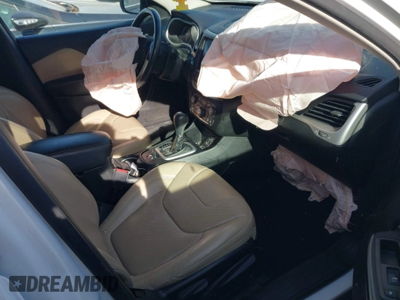 2015 Jeep Cherokee Limited with VIN 1C4PJLDB9FW677367, listed as a IAAI auction lot 41826477 with 125,648 mi miles and . Bid and sale history available at DreamBid. Image 5.