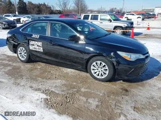 2015 Toyota Camry Hybrid LE with VIN 4T1BD1FK0FU143362, listed as a IAAI auction lot 41635833 with 156,114 mi miles. Bid and sale history available at carsss.com. Image 1.