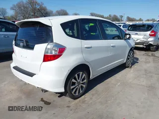 2013 Honda Fit Sport with VIN JHMGE8H54DC059358, listed as a IAAI auction lot 41776717 with 90,595 mi miles. Bid and sale history available at carsss.com. Image 4.