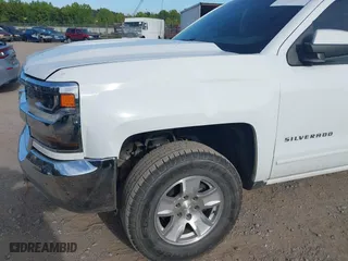 2018 Chevrolet Silverado 1500 LT with VIN 1GCVKREHXJZ314495, listed as a IAAI auction lot 40043813 with 158,597 mi miles. Bid and sale history available at carsss.com. Image 6.
