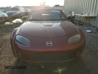 2007 Mazda MX-5 Miata Sport z VIN JM1NC25F970124896, wystawiony jako Copart lot #83624394 z przebiegiem 62 735 mil mil oraz Szkoda całkowita • Salvage title. Historia ofert i sprzedaży dostępna na DreamBid. Obrazek 5.