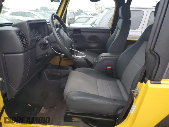 2002 Jeep Wrangler Sport with VIN 1J4FA49S12P746058, listed as a Copart auction lot 75060604 with Not Provided miles and Non Repairable. Bid and sale history available at carsss.com. Image 7.