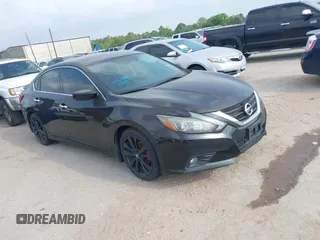 2017 Nissan Altima SR with VIN 1N4AL3AP0HC217024, listed as a IAAI auction lot 41729879 with 127,385 mi miles and . Bid and sale history available at carsss.com. Image 1.