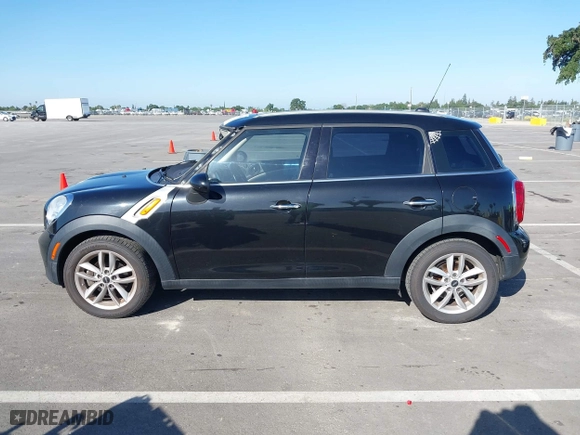 2013 MINI Cooper Countryman with VIN WMWZB3C52DWM07621, listed as a IAAI auction lot 42085389 with 153,714 mi miles. Bid and sale history available at carsss.com. Image 14.