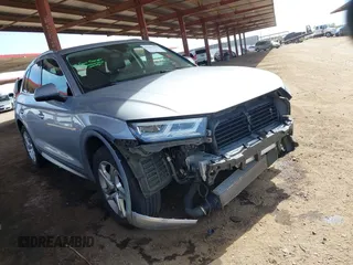 2018 Audi Q5 Premium Plus z VIN WA1BNAFY9J2055656, wystawiony jako IAAI lot #42187509 z przebiegiem 74 572 mil mil oraz . Historia ofert i sprzedaży dostępna na DreamBid. Obrazek 1.