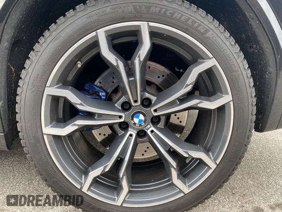 2021 BMW X3 M z VIN 5YMTS0C05M9G46973, wystawiony jako IAAI lot #41334083 z przebiegiem 42 819 mil mil oraz . Historia ofert i sprzedaży dostępna na DreamBid. Obrazek 16.