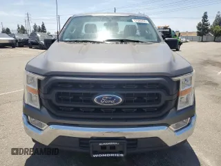 2021 Ford F-150 XL with VIN 1FTMF1C58MKE24095, listed as a Copart auction lot 57686455 with 60,583 mi miles and Salvage title. Bid and sale history available at DreamBid. Image 5.