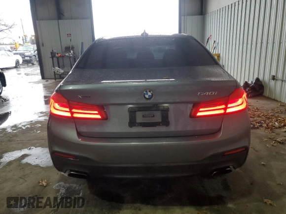 2018 BMW 5 Series 540i xDrive with VIN WBAJE7C59JWD52143, listed as a Copart auction lot 83438484 with 103,401 mi miles and Salvage title. Bid and sale history available at DreamBid. Image 6.