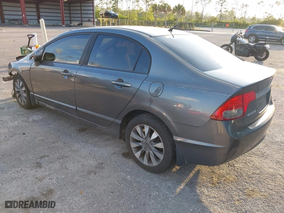 2010 Honda Civic Sdn EX with VIN 19XFA1F80AE026715, listed as a IAAI auction lot 41887154 with 128,272 mi miles. Bid and sale history available at carsss.com. Image 3.