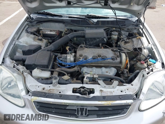 1999 Honda Civic LX with VIN JHMEJ6671XS003027, listed as a IAAI auction lot 41825146 with 197,764 mi miles and . Bid and sale history available at DreamBid. Image 10.