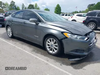 2016 Ford Fusion SE Hybrid with VIN 3FA6P0LU6GR127095, listed as a IAAI auction lot 42013324 with 134,474 mi miles and . Bid and sale history available at DreamBid. Image 1.