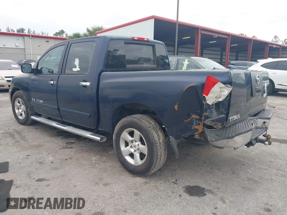 2007 Nissan Titan XE with VIN 1N6BA07AX7N236492, listed as a IAAI auction lot 41668602 with 205,028 mi miles. Bid and sale history available at carsss.com. Image 3.