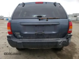 2004 Jeep Grand Cherokee Laredo with VIN 1J4GW48S64C262632, listed as a Copart auction lot 55175415 with 153,401 mi miles and Clean Title. Bid and sale history available at carsss.com. Image 6.