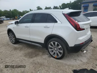 2023 Cadillac XT4 FWD Premium Luxury with VIN 1GYFZCR42PF193101, listed as a Copart auction lot 54977605 with 14,258 mi miles and Non repairable. Bid and sale history available at DreamBid. Image 2.