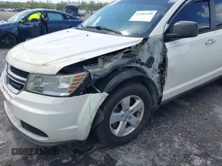 2013 Dodge Journey Canada Value z VIN 3C4PDCAB1DT646810, wystawiony jako IAAI lot #42484918 z przebiegiem 212 456 mil mil oraz . Historia ofert i sprzedaży dostępna na DreamBid. Obrazek 6.