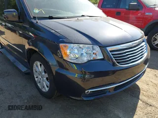 2014 Chrysler Town & Country Touring with VIN 2C4RC1BG2ER124461, listed as a IAAI auction lot 42181413 with 181,360 mi miles and . Bid and sale history available at DreamBid. Image 6.
