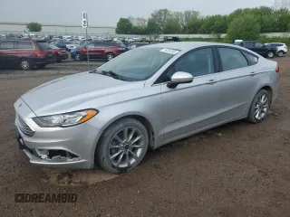 2017 Ford Fusion Hybrid SE with VIN 3FA6P0LU4HR384645, listed as a Copart auction lot 56454995 with 165,322 mi miles and Clean title. Bid and sale history available at DreamBid. Image 1.