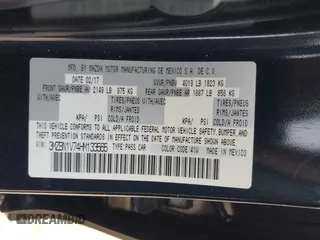 2017 Mazda 3 Touring z VIN 3MZBN1V74HM133565, wystawiony jako IAAI lot #42160836 z przebiegiem 104 997 mil mil oraz . Historia ofert i sprzedaży dostępna na DreamBid. Obrazek 9.