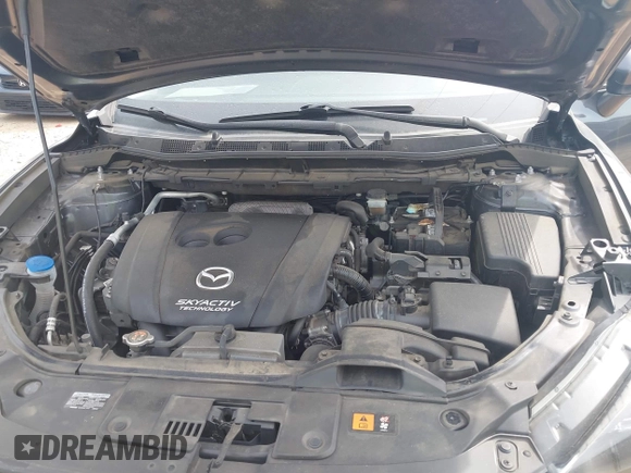 2016 Mazda CX-5 Grand Touring z VIN JM3KE2DY5G0801238, wystawiony jako IAAI lot #42264694 z przebiegiem 136 993 mil mil oraz . Historia ofert i sprzedaży dostępna na DreamBid. Obrazek 10.