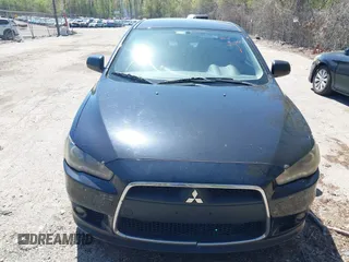 2012 Mitsubishi Lancer GT with VIN JA32U8FW6CU021485, listed as a IAAI auction lot 42159256 with 138,455 mi miles. Bid and sale history available at carsss.com. Image 6.