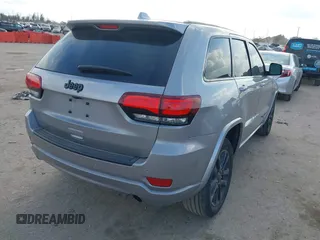 2020 Jeep Grand Cherokee Altitude with VIN 1C4RJEAGXLC403693, listed as a IAAI auction lot 41482425 with 67,161 mi miles and . Bid and sale history available at DreamBid. Image 4.