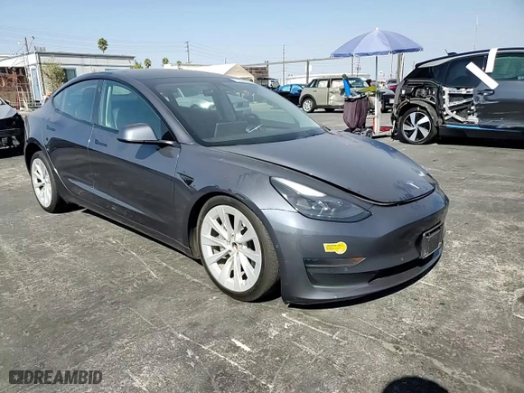2022 Tesla Model 3 with VIN 5YJ3E1EA1NF372879, listed as a Copart auction lot 71604604 with 60,925 mi miles and Salvage Title. Bid and sale history available at carsss.com. Image 11.
