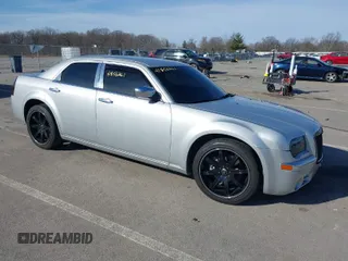 2007 Chrysler 300 C with VIN 2C3KA63H57H653380, listed as a IAAI auction lot 41856261 with 150,015 mi miles. Bid and sale history available at carsss.com. Image 1.