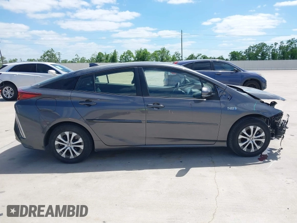 2021 Toyota Prius LE with VIN JTDKAMFP3M3193640, listed as a IAAI auction lot 42023593 with 17,841 mi miles and . Bid and sale history available at DreamBid. Image 14.