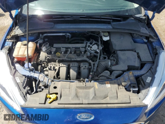 2018 Ford Focus SE z VIN 1FADP3F20JL293119, wystawiony jako Copart lot #58376765 z przebiegiem 38 322 mil mil oraz Szkoda całkowita • Salvage title. Historia ofert i sprzedaży dostępna na DreamBid. Obrazek 11.