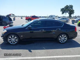 2007 Infiniti M Sport z VIN JNKAY01E17M312062, wystawiony jako IAAI lot #42356818 z przebiegiem 172 780 mil mil oraz . Historia ofert i sprzedaży dostępna na DreamBid. Obrazek 14.
