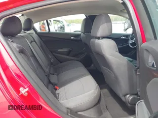 2017 Chevrolet Cruze LT z VIN 1G1BE5SM7H7121403, wystawiony jako IAAI lot #42082400 z przebiegiem 34 720 mil mil oraz . Historia ofert i sprzedaży dostępna na DreamBid. Obrazek 8.