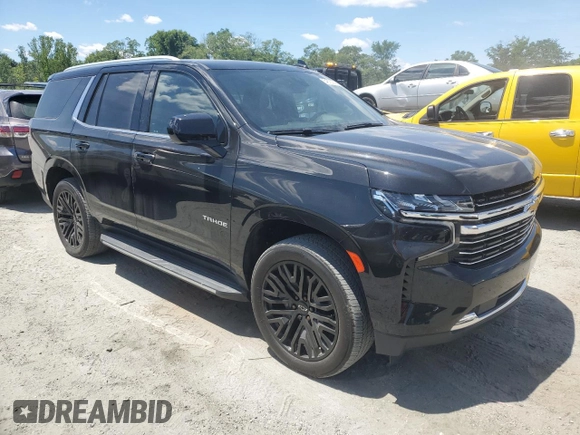 2021 Chevrolet Tahoe LT with VIN 1GNSKNKD4MR262628, listed as a Copart auction lot 54875235 with 90,533 mi miles and Salvage title. Bid and sale history available at DreamBid. Image 4.