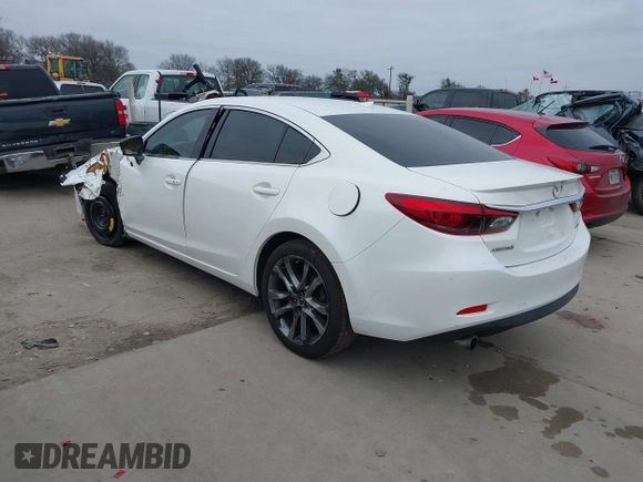 2017 Mazda 6 Grand Touring with VIN JM1GL1W57H1126716, listed as a IAAI auction lot 41619715 with 105,332 mi miles and . Bid and sale history available at DreamBid. Image 3.