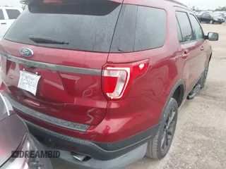 2018 Ford Explorer XLT z VIN 1FM5K7D87JGA87814, wystawiony jako IAAI lot #42393275 z przebiegiem 39 672 mil mil oraz . Historia ofert i sprzedaży dostępna na DreamBid. Obrazek 4.