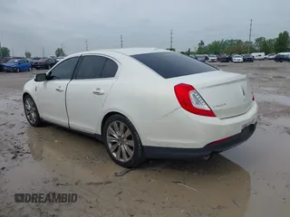 2013 Lincoln MKS EcoBoost with VIN 1LNHL9FT4DG604661, listed as a IAAI auction lot 42211781 with 134,902 mi miles and . Bid and sale history available at DreamBid. Image 3.