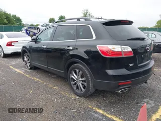 2012 Mazda CX-9 Grand Touring z VIN JM3TB2DAXC0338667, wystawiony jako IAAI lot #42260820 z przebiegiem 138 111 mil mil oraz . Historia ofert i sprzedaży dostępna na DreamBid. Obrazek 3.