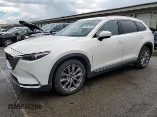 2018 Mazda CX-9 Grand Touring with VIN JM3TCBDY2J0215906, listed as a Copart auction lot 56881335 with 104,839 mi miles and Salvage title. Bid and sale history available at DreamBid. Image 1.