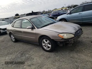 2004 Ford Taurus SE with VIN 1FAFP53U34G129631, listed as a Copart auction lot 45054375 with 182,089 mi miles and Salvage title. Bid and sale history available at DreamBid. Image 4.