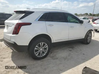 2021 Cadillac XT5 FWD Premium Luxury z VIN 1GYKNCRS7MZ115531, wystawiony jako Copart lot #53611095 z przebiegiem 34 931 mil mil oraz Szkoda całkowita • Salvage title. Historia ofert i sprzedaży dostępna na DreamBid. Obrazek 3.