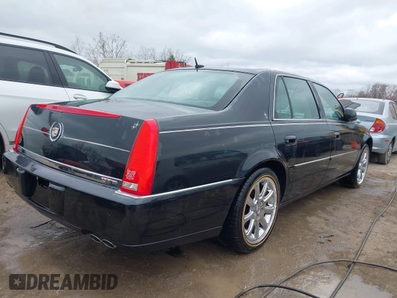 2008 Cadillac DTS 1SC with VIN 1G6KD57Y18U180943, listed as a IAAI auction lot 42031463 with 161,159 mi miles and . Bid and sale history available at carsss.com. Image 4.