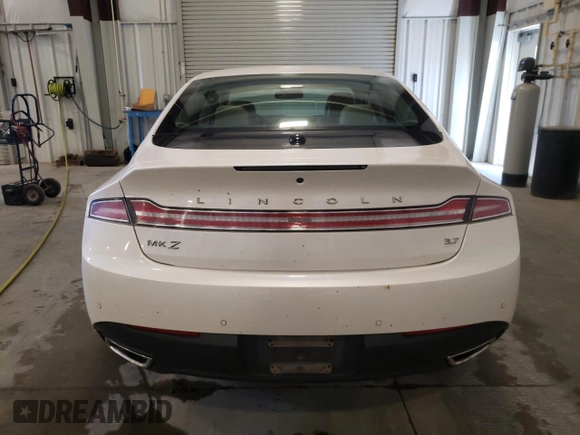 2016 Lincoln MKZ z VIN 3LN6L2GK6GR624511, wystawiony jako Copart lot #56137625 z przebiegiem 88 289 mil mil oraz Szkoda całkowita • Salvage title. Historia ofert i sprzedaży dostępna na DreamBid. Obrazek 6.