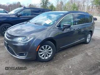 2017 Chrysler Pacifica Touring L with VIN 2C4RC1BGXHR667397, listed as a IAAI auction lot 42085117 with 63,996 mi miles and . Bid and sale history available at DreamBid. Image 19.