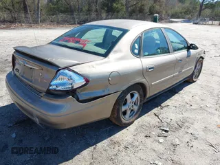2002 Ford Taurus SES Standard with VIN 1FAFP55S72A256247, listed as a IAAI auction lot 41584035 with 194,270 mi miles. Bid and sale history available at carsss.com. Image 4.