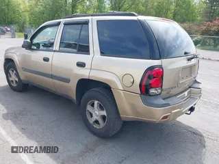2004 Chevrolet TrailBlazer LS with VIN 1GNDT13S842241592, listed as a IAAI auction lot 42245353 with 115,691 mi miles and . Bid and sale history available at DreamBid. Image 3.