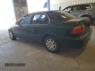 2000 Honda Civic LX with VIN JHMEJ6679YS005805, listed as a Copart auction lot 49810095 with 224,984 mi miles and Salvage Title. Bid and sale history available at DreamBid. Image 2.