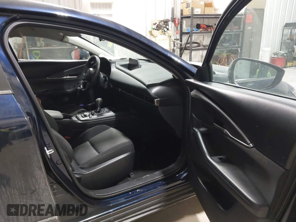 2023 Mazda CX-30 S with VIN 3MVDMBAM9PM586335, listed as a IAAI auction lot 41392541 with 12,463 mi miles and . Bid and sale history available at DreamBid. Image 5.