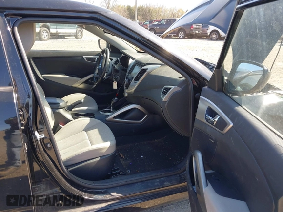 2013 Hyundai Veloster w/Gray Int with VIN KMHTC6AD4DU131242, listed as a IAAI auction lot 42074517 with 76,713 mi miles and . Bid and sale history available at DreamBid. Image 5.